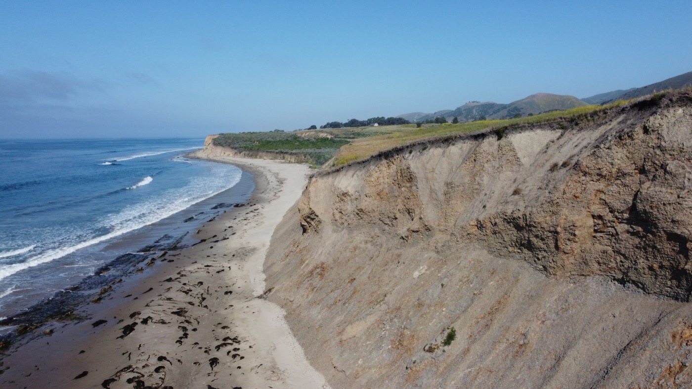 Waves breaking below the coastal bluffs