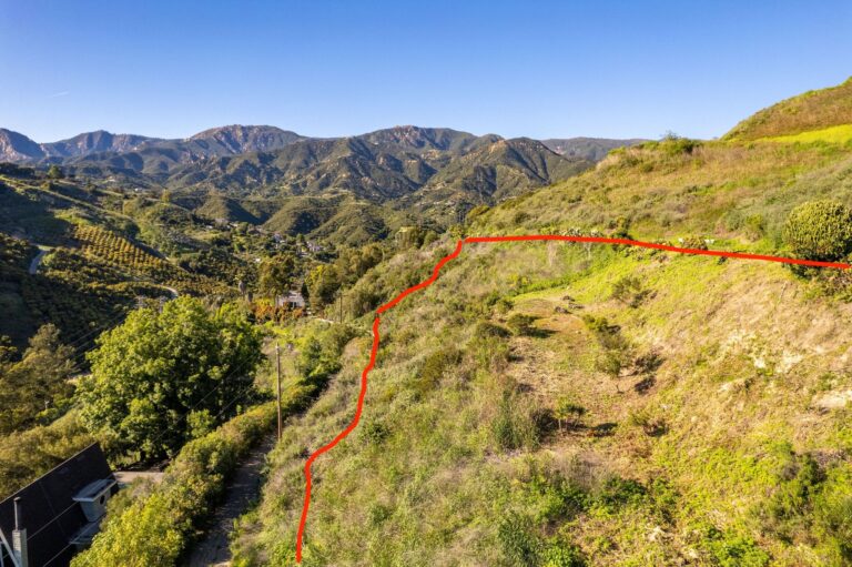 Approximate boundary line along the hillside with the mountains behind
