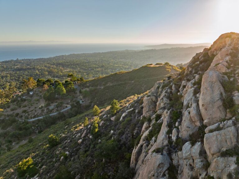 Steep canyon walls and natural land on the property