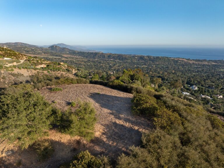The hilltop homesite with the coast beyond