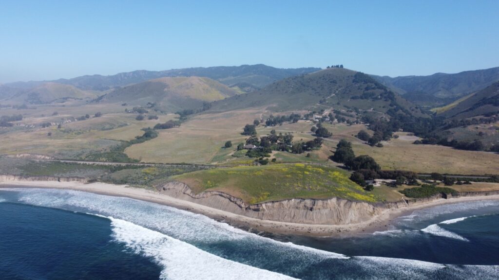 Aerial view of the Hollister Ranch coastline, ranch parcels and hills on the Gaviota Coast